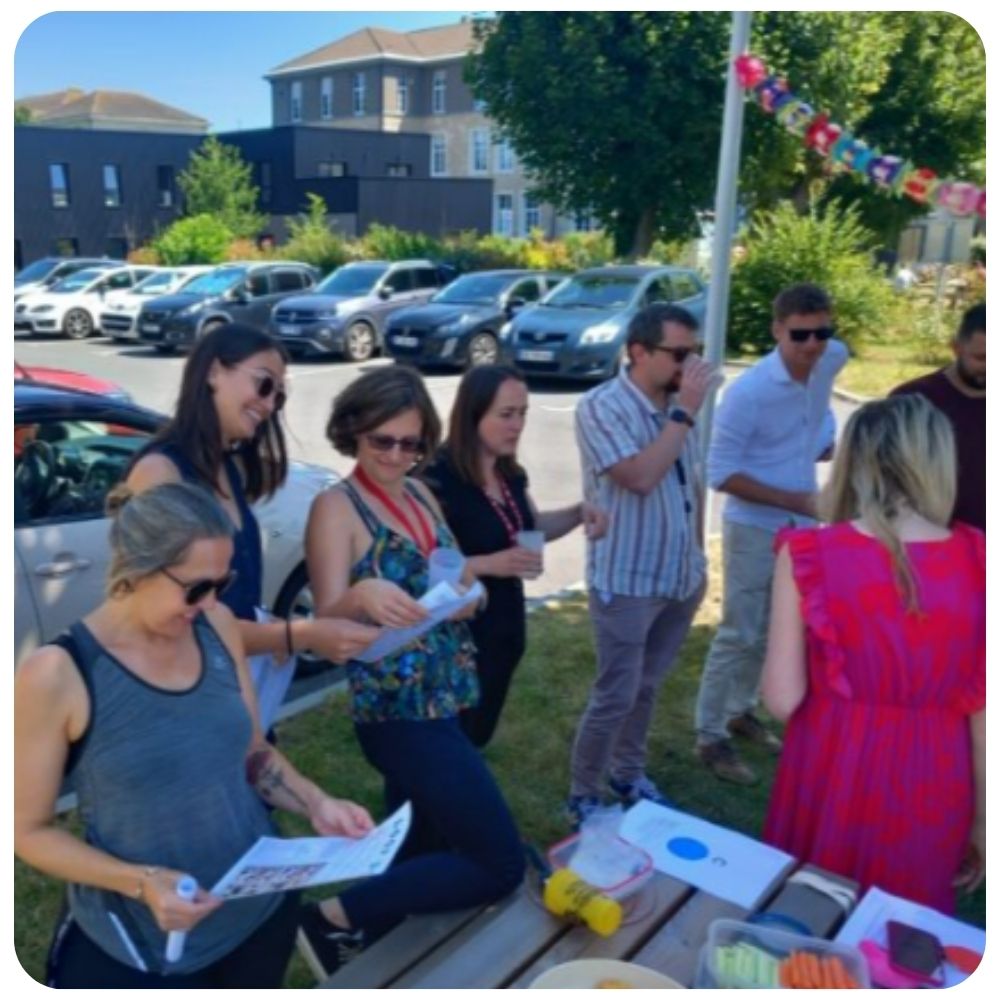 Loop Dee Science team in team building activity during a company picnic.